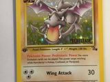 a close up of a pokemon card on a white surface