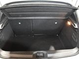 a trunk of a car with its doors open