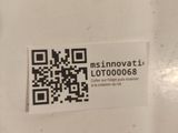 a picture of a qr code on a toilet seat