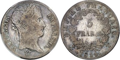 a close up of a coin with a woman ' s face on it
