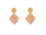 a pair of gold earrings with pink beads on a white background