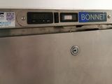 an image of a stainless steel oven with a digital clock on the front