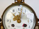 a clock that has a price tag on it