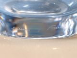 a close up of a glass of water on a table