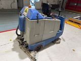 a machine that is sitting on the floor in a building