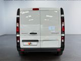 a white van that is parked in a room