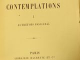 an old book with a black and white title on it