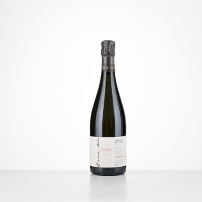 a bottle of wine that is sitting on a table