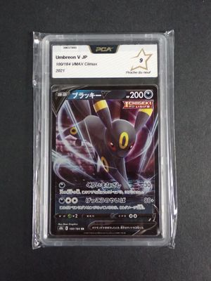 the card is in a clear plastic case on a table