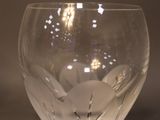 a clear glass bowl with rocks inside of it