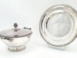 silver plate with a lid and a silver bowl on a stand