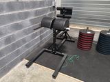 an image of a gym equipment set up in front of a wall