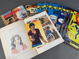 a lot of books that are on a table