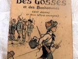 an old book with a picture of a boy on it