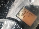 a close up of a car dashboard with a speedometer