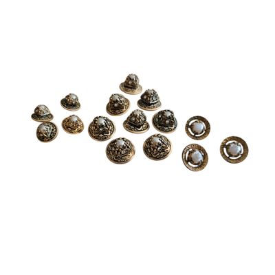 a close up of a bunch of buttons on a white surface