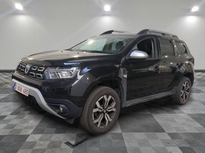 a picture of a black dacia parked on a checkered floor