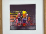 painting of a cityscape in a wooden frame on a wall