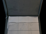 a open suitcase with a lot of papers inside of it