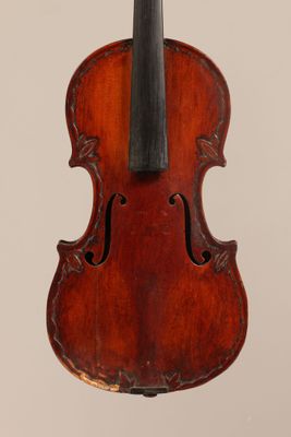 an old violin with a bow on a white background