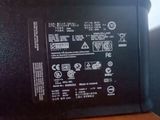 a laptop that is sitting on a wooden table