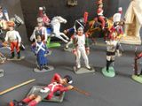 a lot of toy soldiers that are on a table