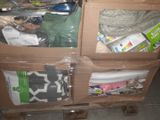 a cardboard box that has a bunch of items inside of it