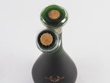 a bottle of wine that is sitting on a table