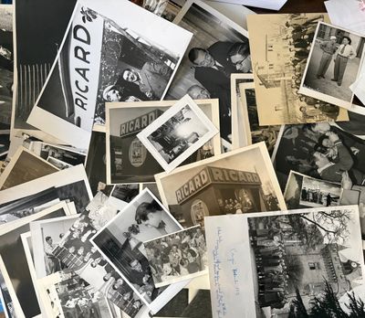 several old black and white photos of people in a room
