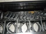 many pairs of scissors in the trays on the stove