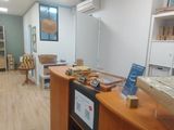an image of a store with a lot of food on the counter