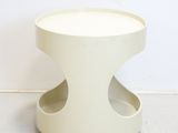 an image of a white coffee table with a circular base
