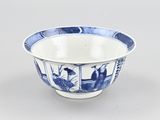 a blue and white bowl sitting on a table
