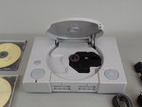 a cd player with a cd in front of it