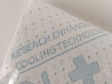 a bag of toilet paper that has a blue and white design on it