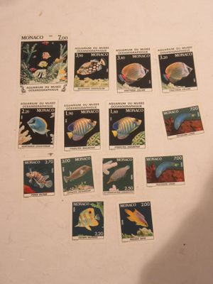 a picture of a collection of stamps with fish on them