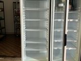 two refrigerated refrigerators in a store