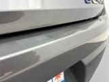 a close up of a car ' s bumper with a sticker on it