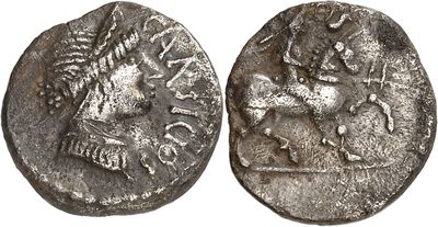 a silver coin with an image of a horse on it