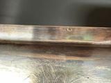 a close up of a piece of wood that has been stained