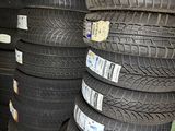a lot of tires stacked on top of each other