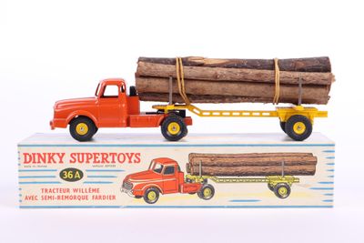a toy truck with a load of logs on the back of it