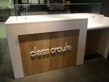 a picture of a glass counter with a glass case behind it
