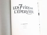 an open book with a black and white image on it