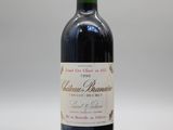 une bouteille de vin rouge portant l'étiquette du Château Brunet