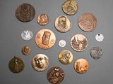 a lot of coins that are on the table
