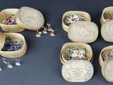 many small boxes with different types of buttons in them