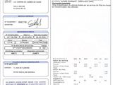 a document with a picture of a man in a suit and tie