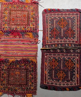 three small rugs hanging on a wall next to each other