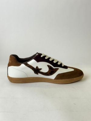 a pair of brown and white sneakers with a brown sole